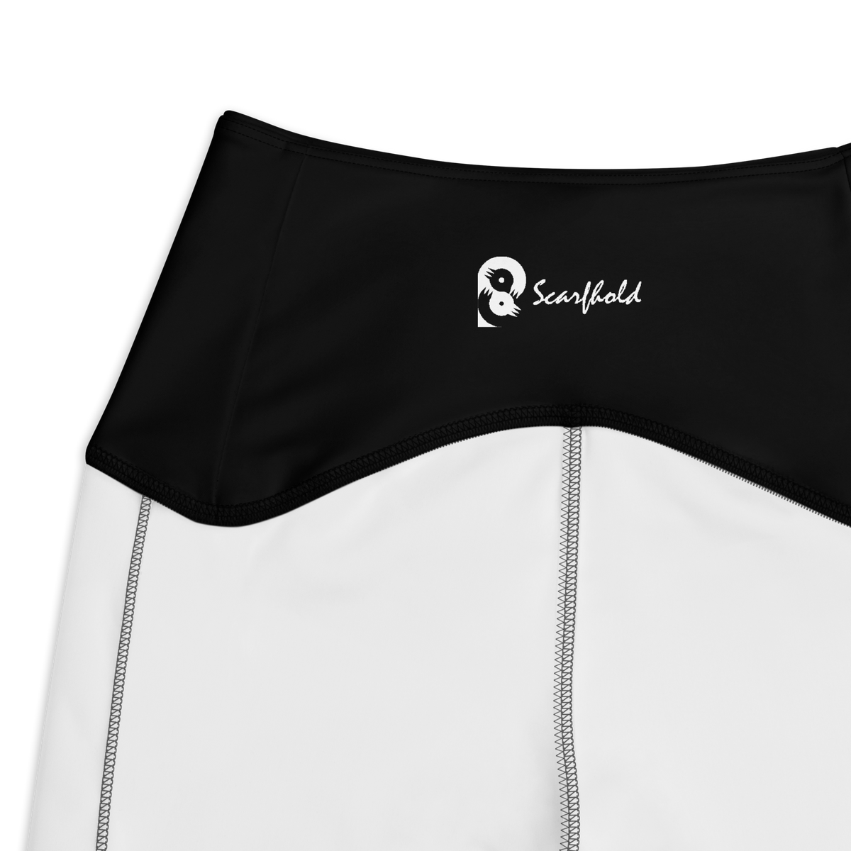 Plain Black high-waisted pocket leggings, inside-label and construction detail.