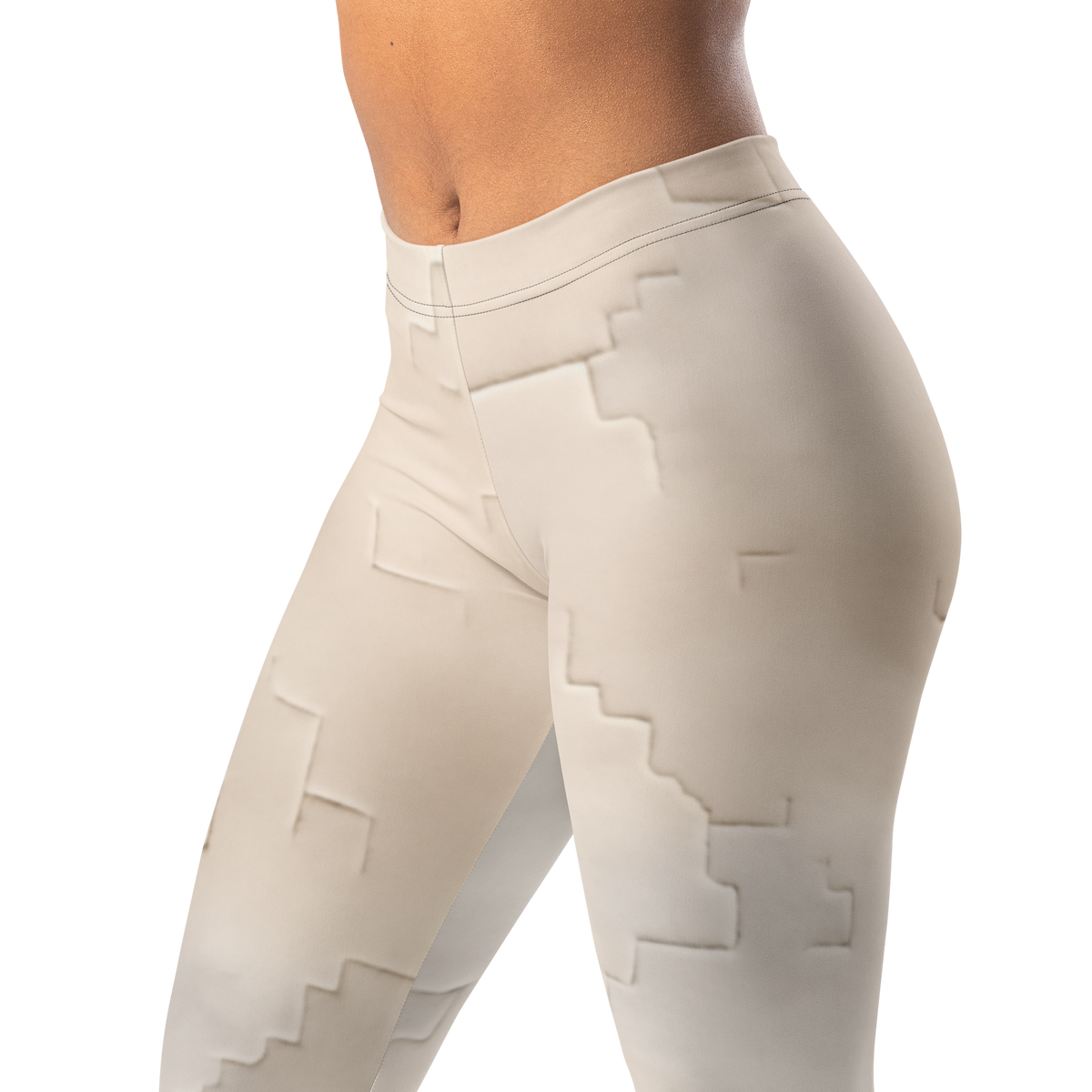 Apparit · Beige mid-rise everyday leggings, waistband and pattern detail.