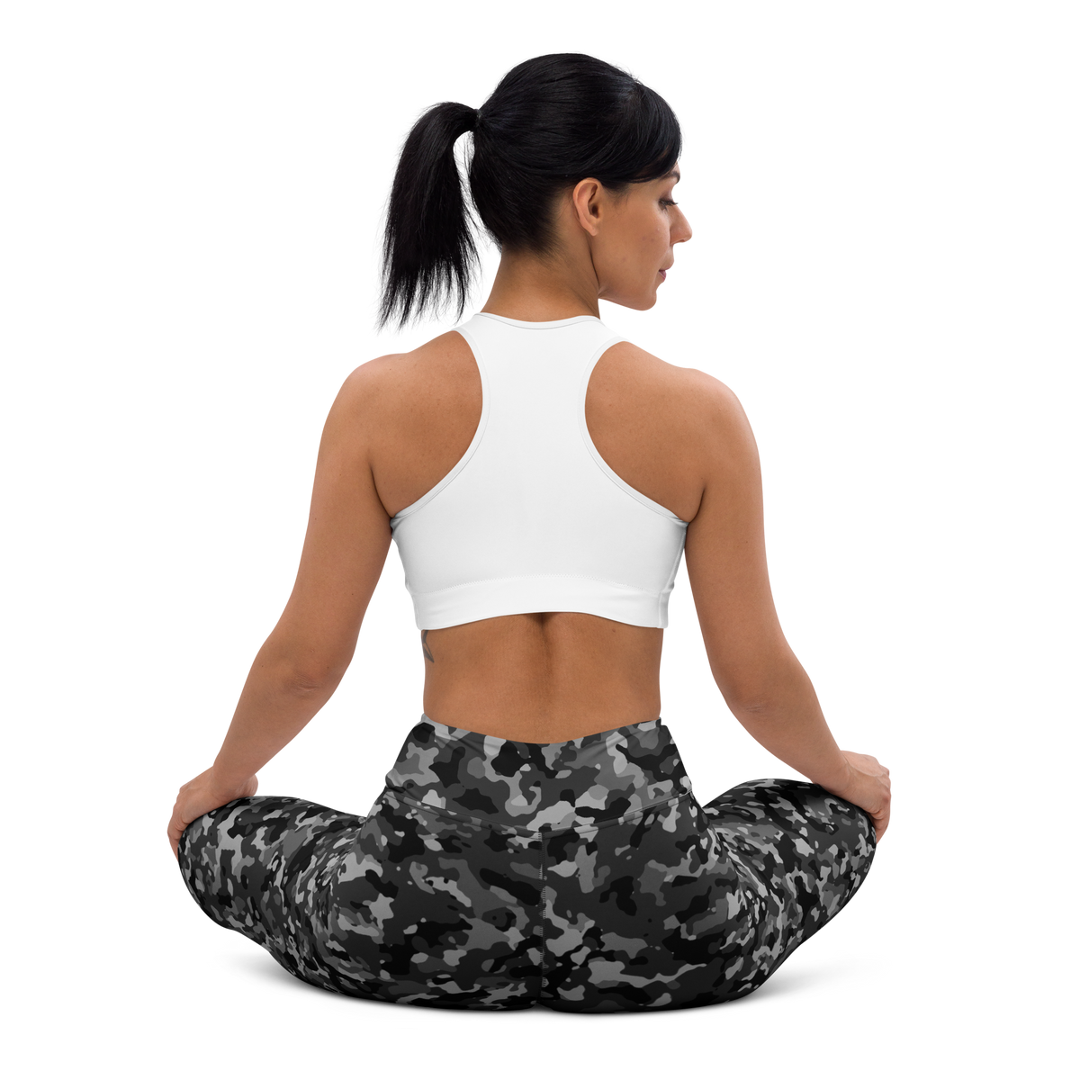 Blizza Greyscale high-waisted yoga leggings, seated back view.