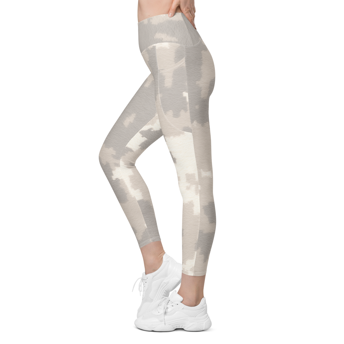 Caspra Beige camouflage high-waisted pocket leggings, movement view.
