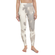 Caspra · Beige high-waisted yoga leggings, straight front view, barefoot.