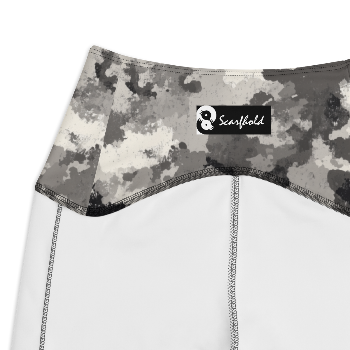 Conculous Static Greyscale camouflage high-waisted pocket leggings, inside-label and construction detail.