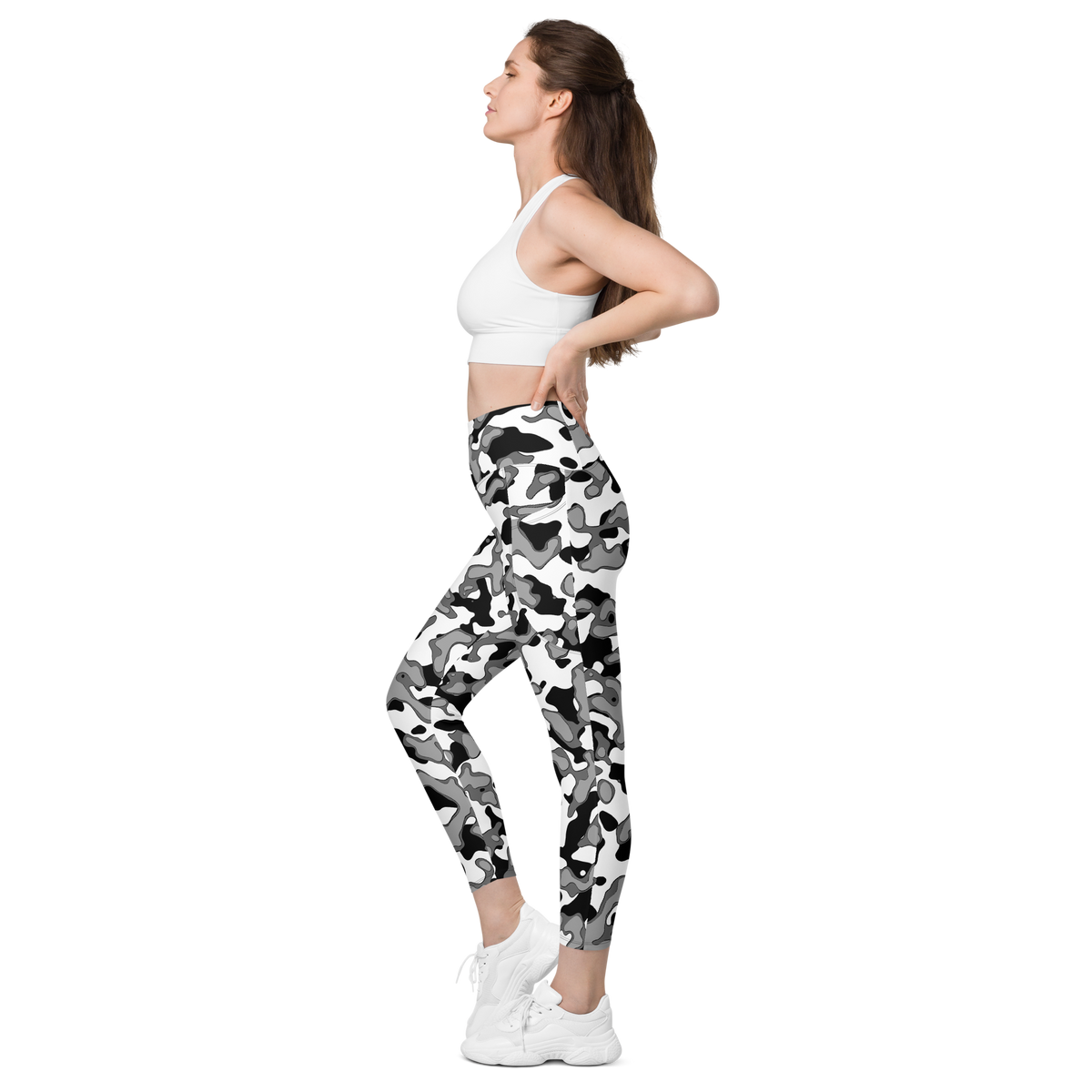 Copse Greyscale high-waisted pocket leggings, pocket-in-use view.