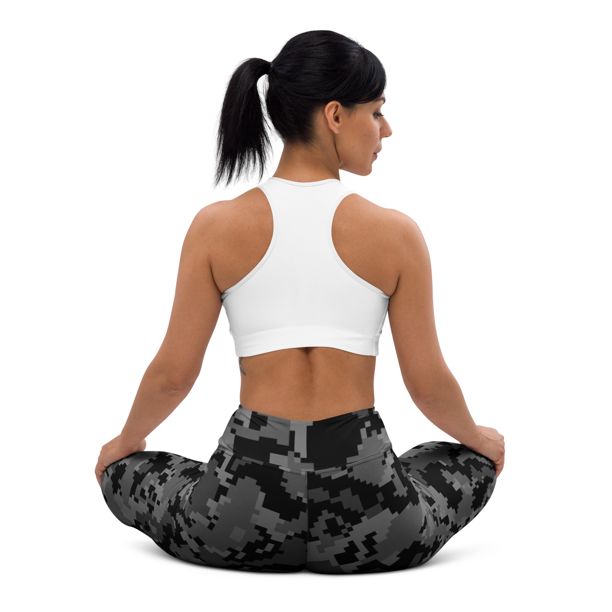 Digita Greyscale 1 camouflage high-waisted yoga leggings, seated back view.