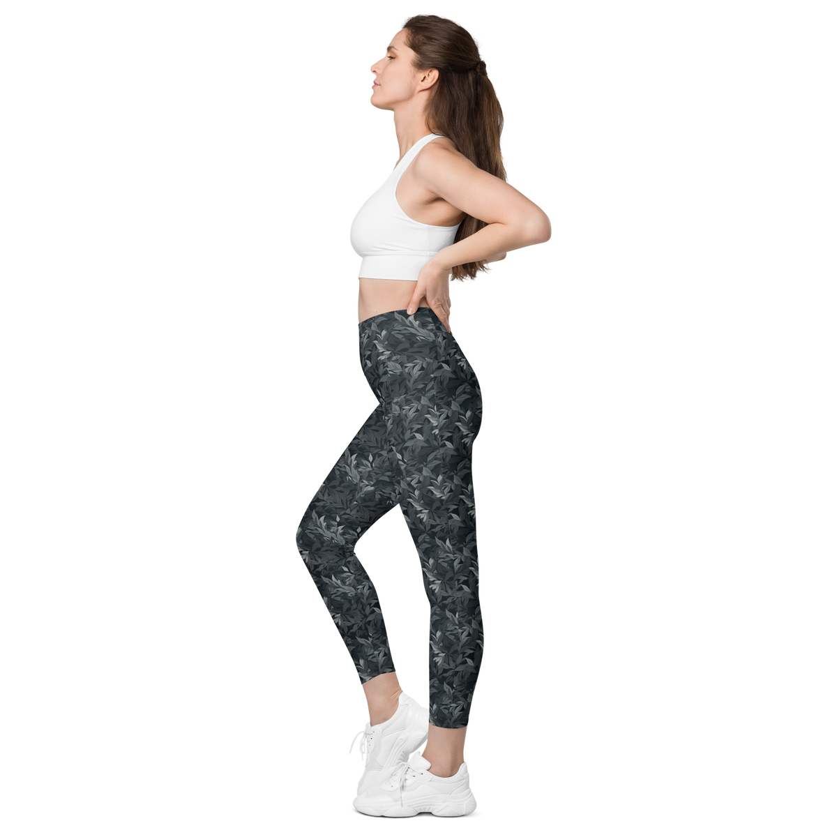 Folia Greyscale high-waisted pocket leggings, pocket-in-use view.