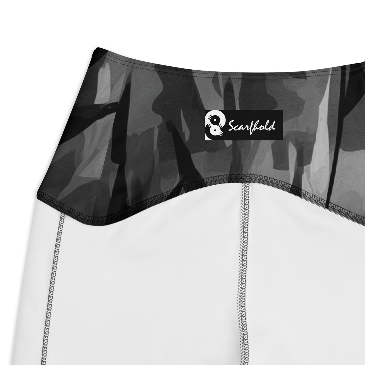 Gardenia Greyscale high-waisted pocket leggings, inside-label and construction detail.