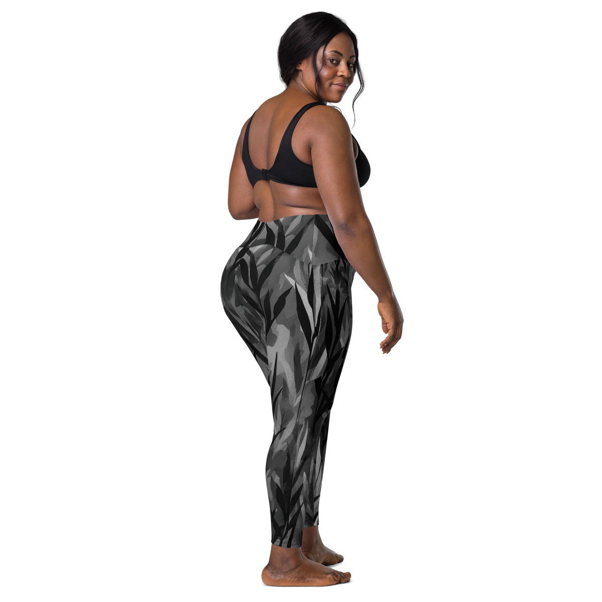 Gardenia Greyscale high-waisted pocket leggings, larger-model back view.