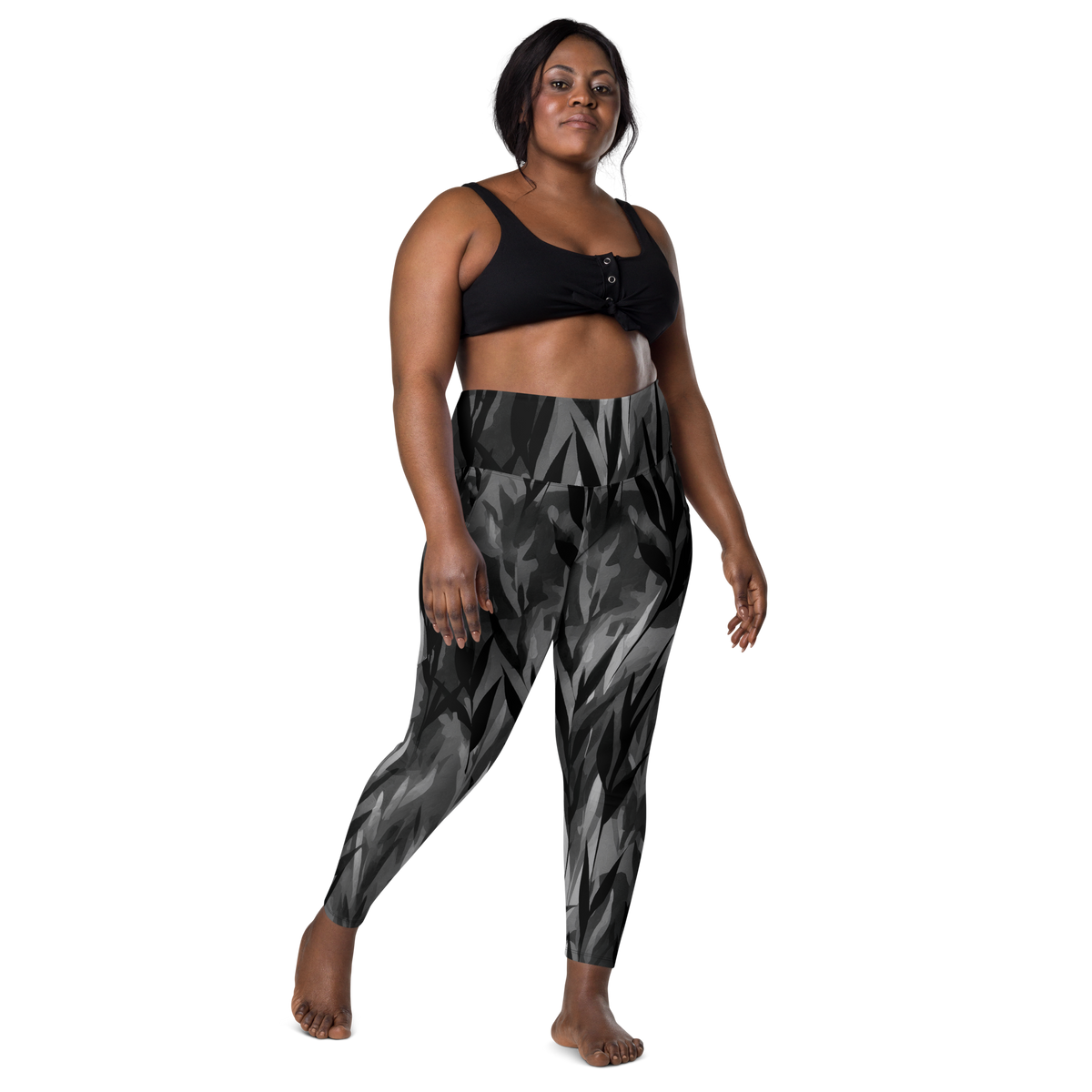 Gardenia Greyscale high-waisted pocket leggings, larger-model front view.