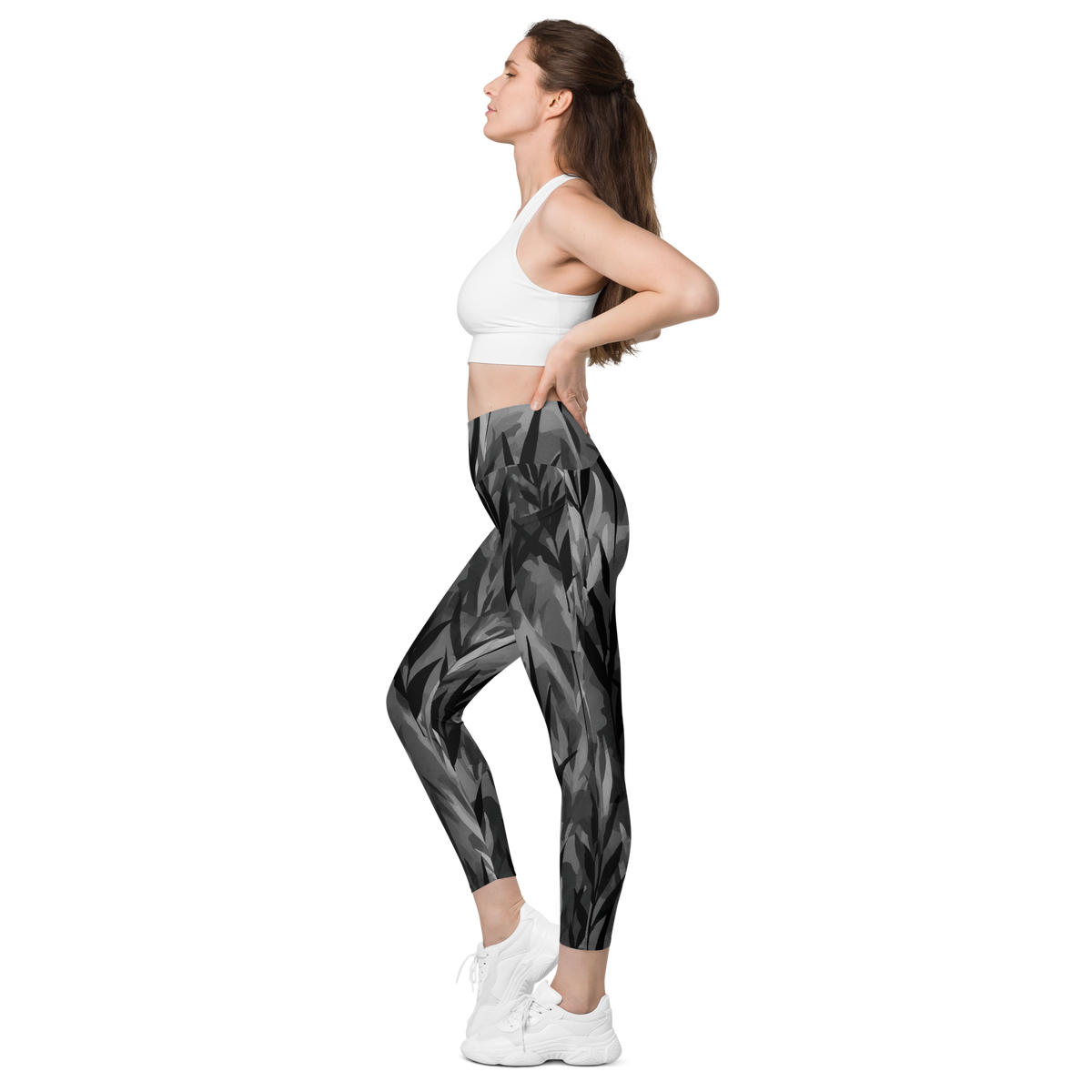 Gardenia Greyscale high-waisted pocket leggings, pocket-in-use view.
