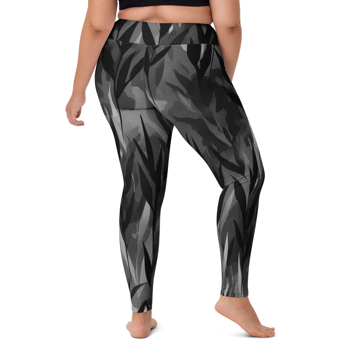 Gardenia Greyscale high-waisted yoga leggings, larger-model right-back view.