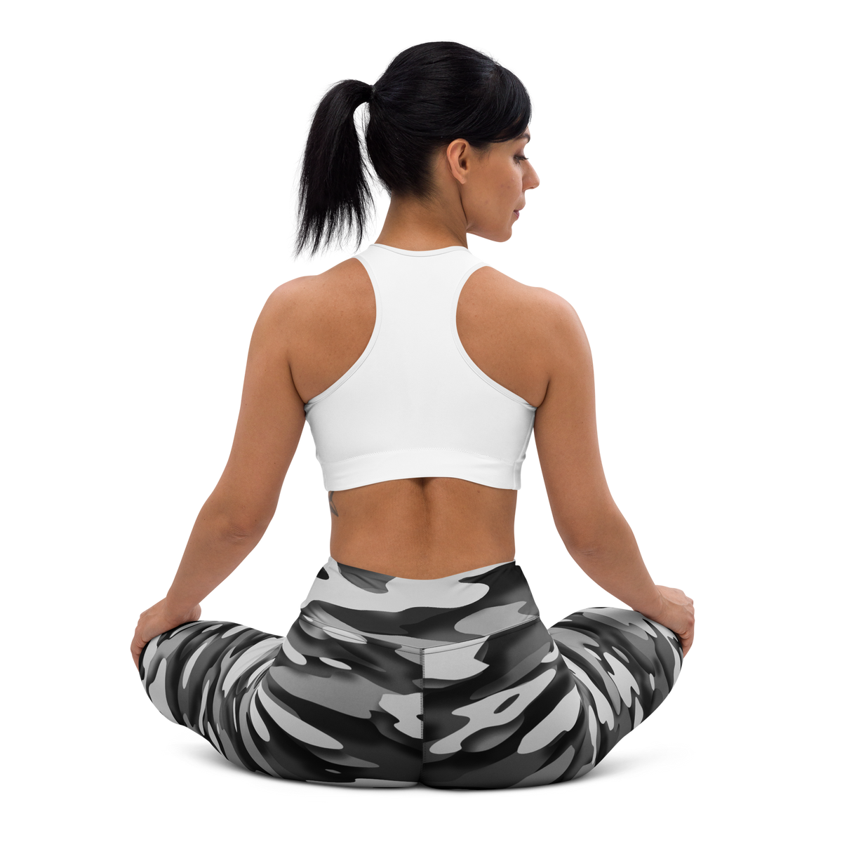 Gulf Greyscale camouflage high-waisted yoga leggings, seated back view.