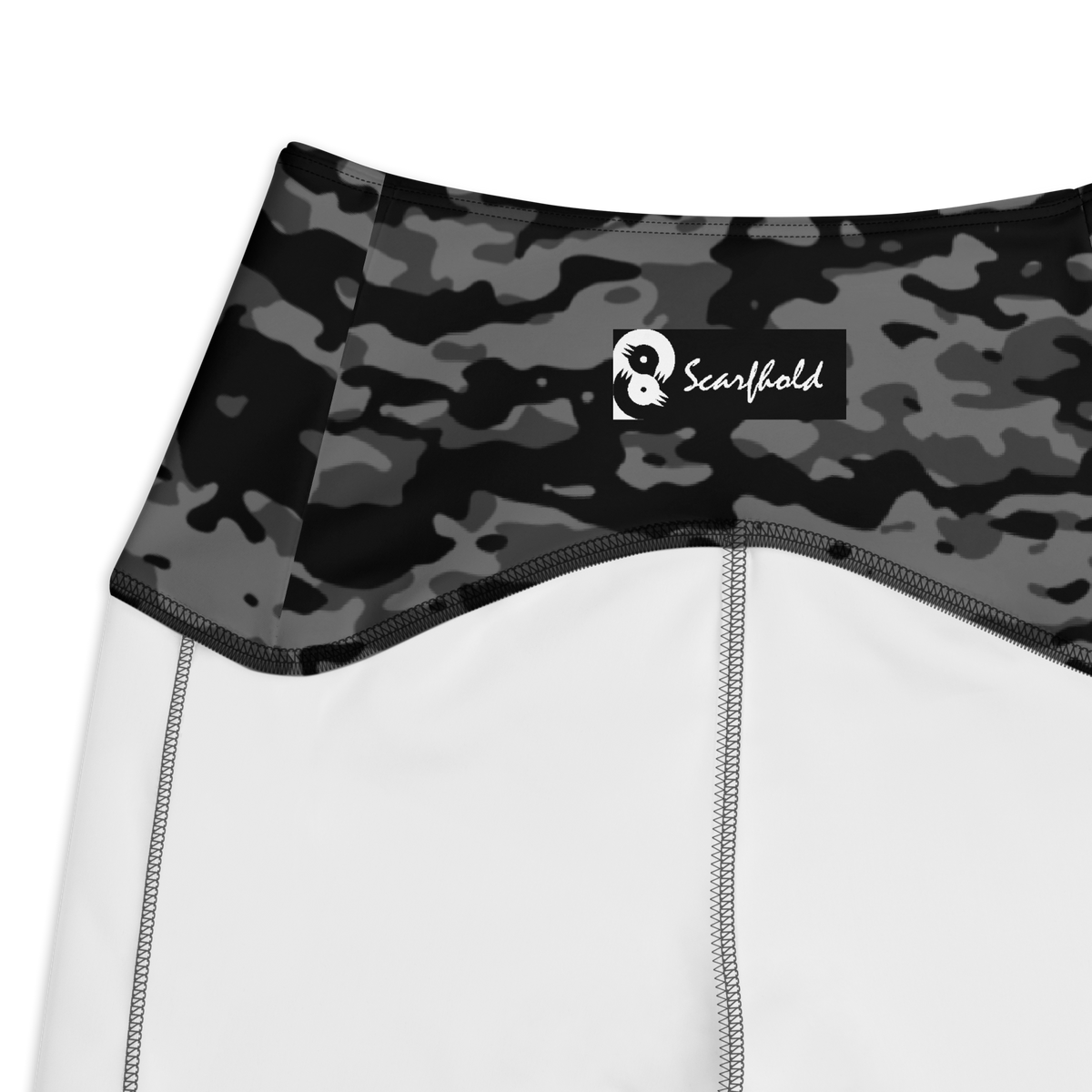 Inka Greyscale camouflage high-waisted pocket leggings, inside-label and construction detail.