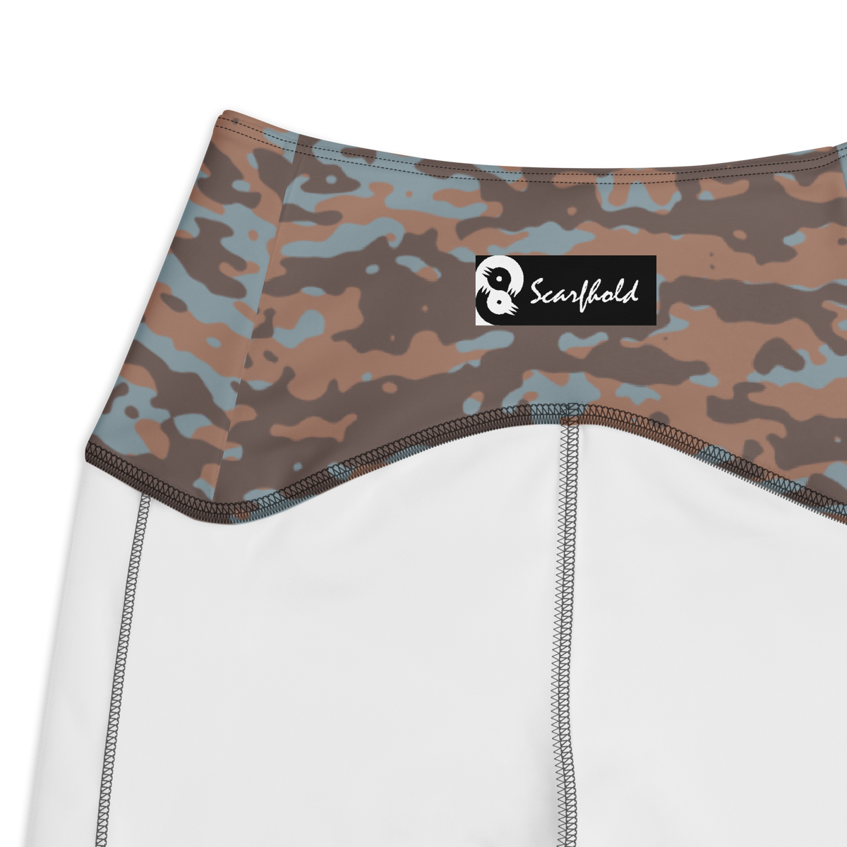 Inka Subtle Contrasts camouflage high-waisted pocket leggings, inside-label and construction detail.