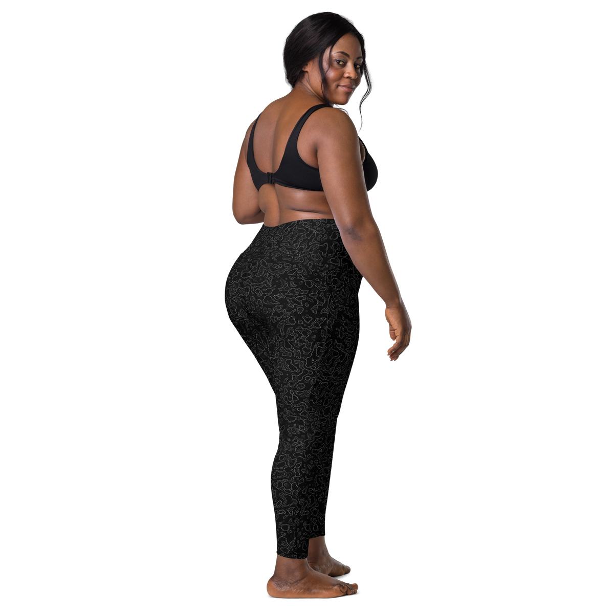 Lava Greyscale high-waisted pocket leggings, larger-model back view.