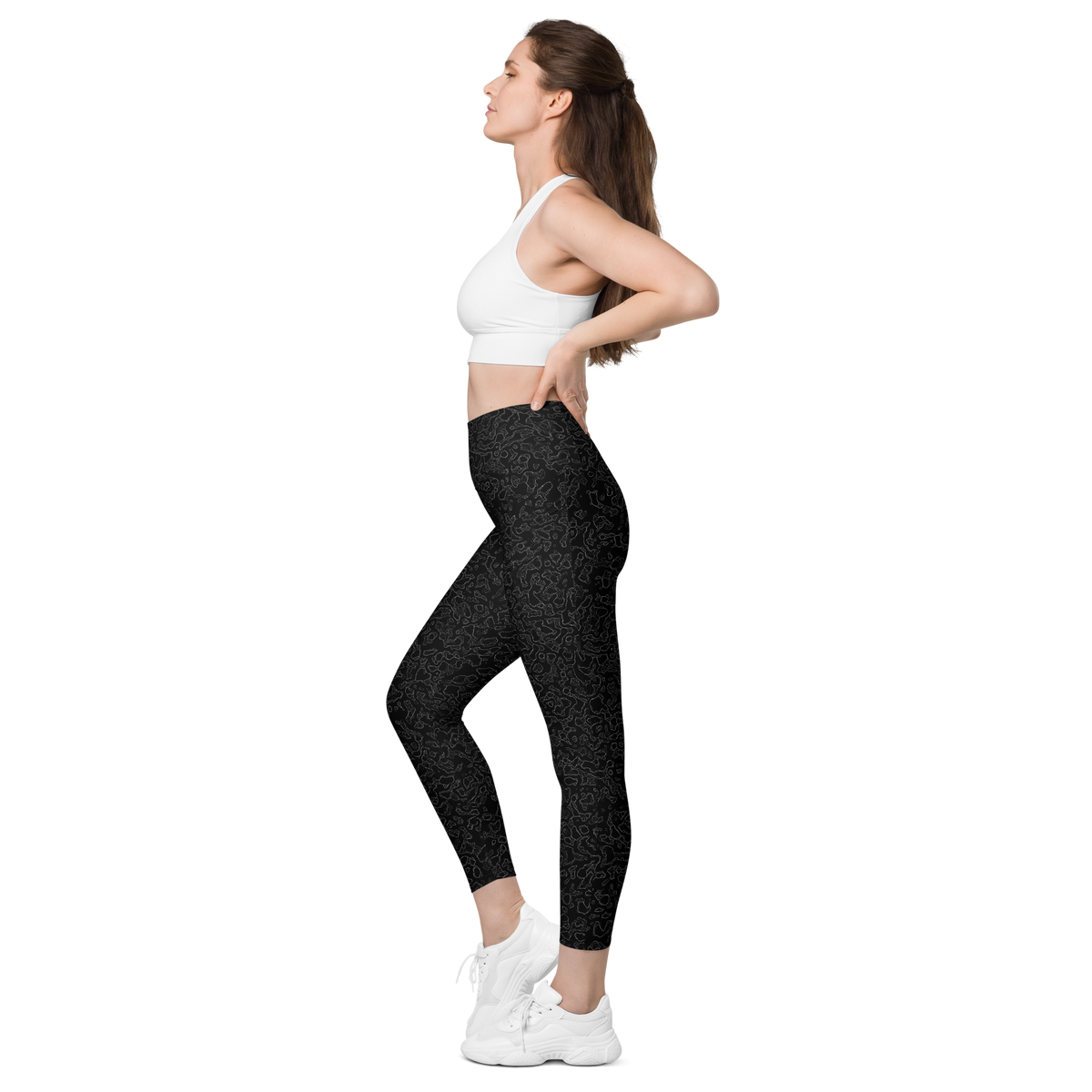 Lava Greyscale high-waisted pocket leggings, pocket-in-use view.
