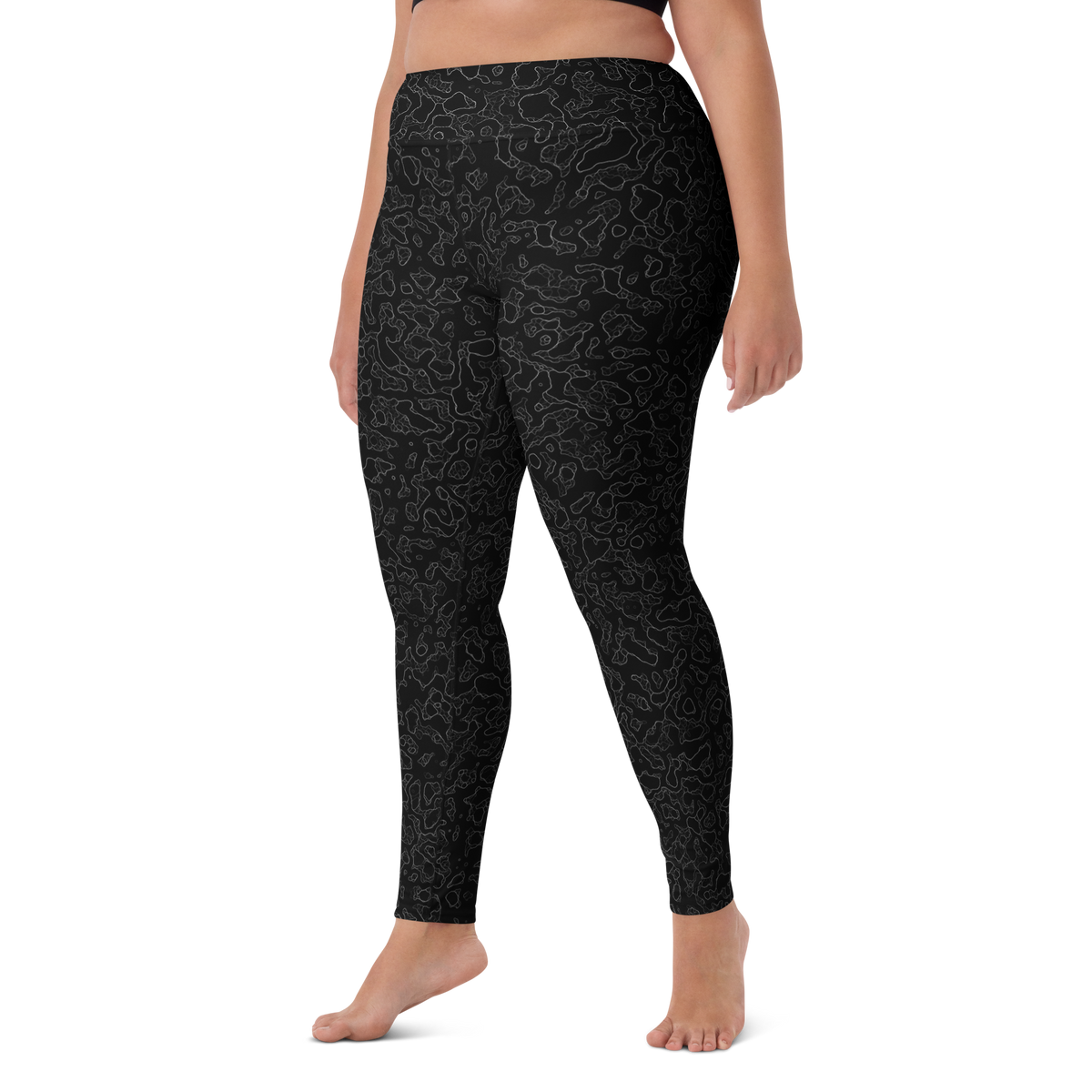 Lava Greyscale high-waisted yoga leggings, larger-model left-front view.