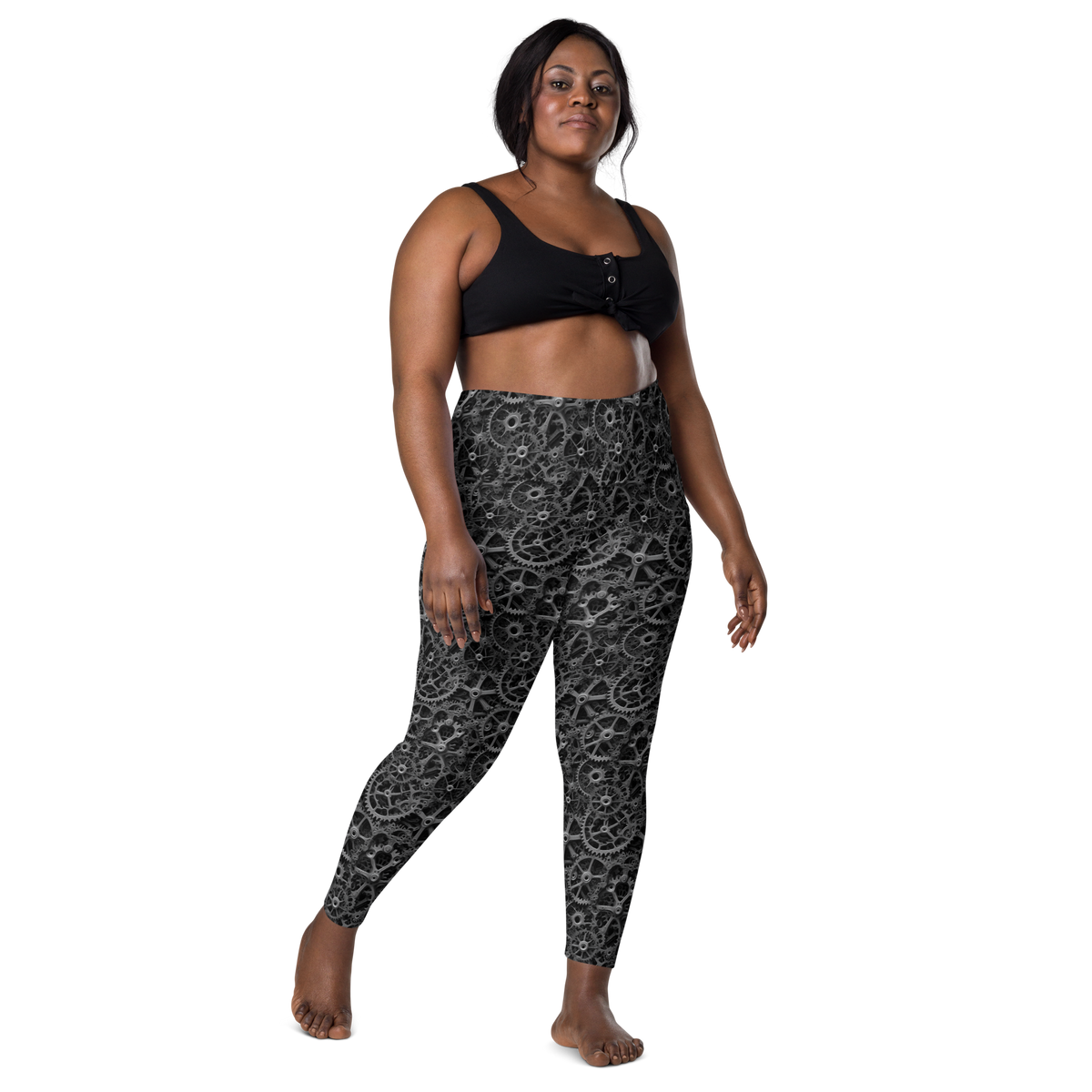 Mechlace Greyscale high-waisted pocket leggings, larger-model front view.