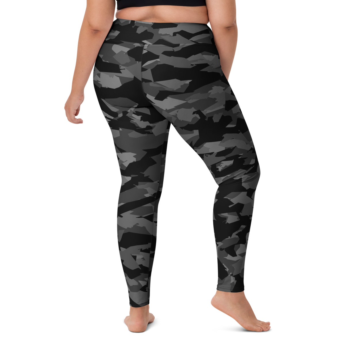 Mica Greyscale camouflage high-waisted yoga leggings, larger-model right-back view.