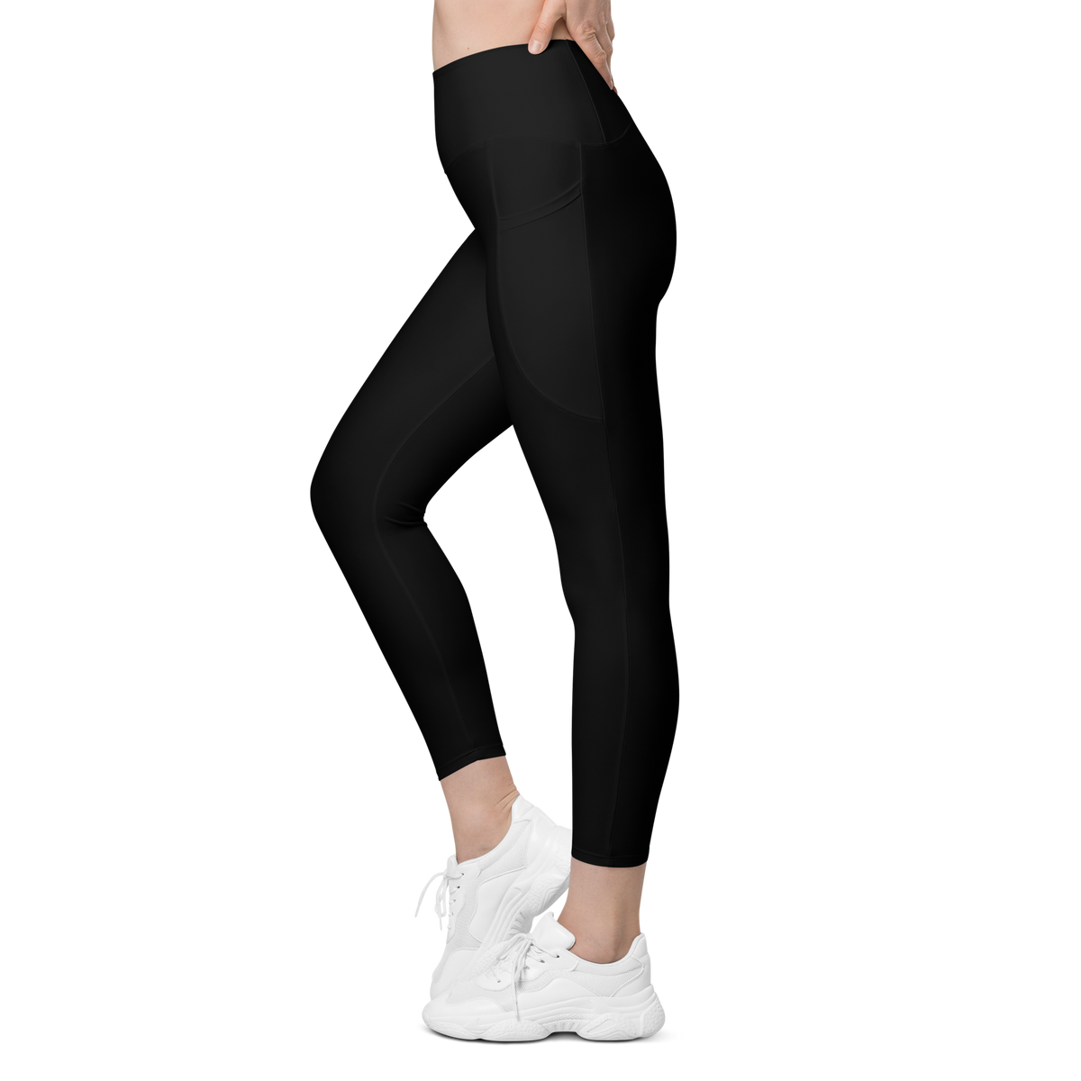 Plain Black high-waisted pocket leggings, movement view.