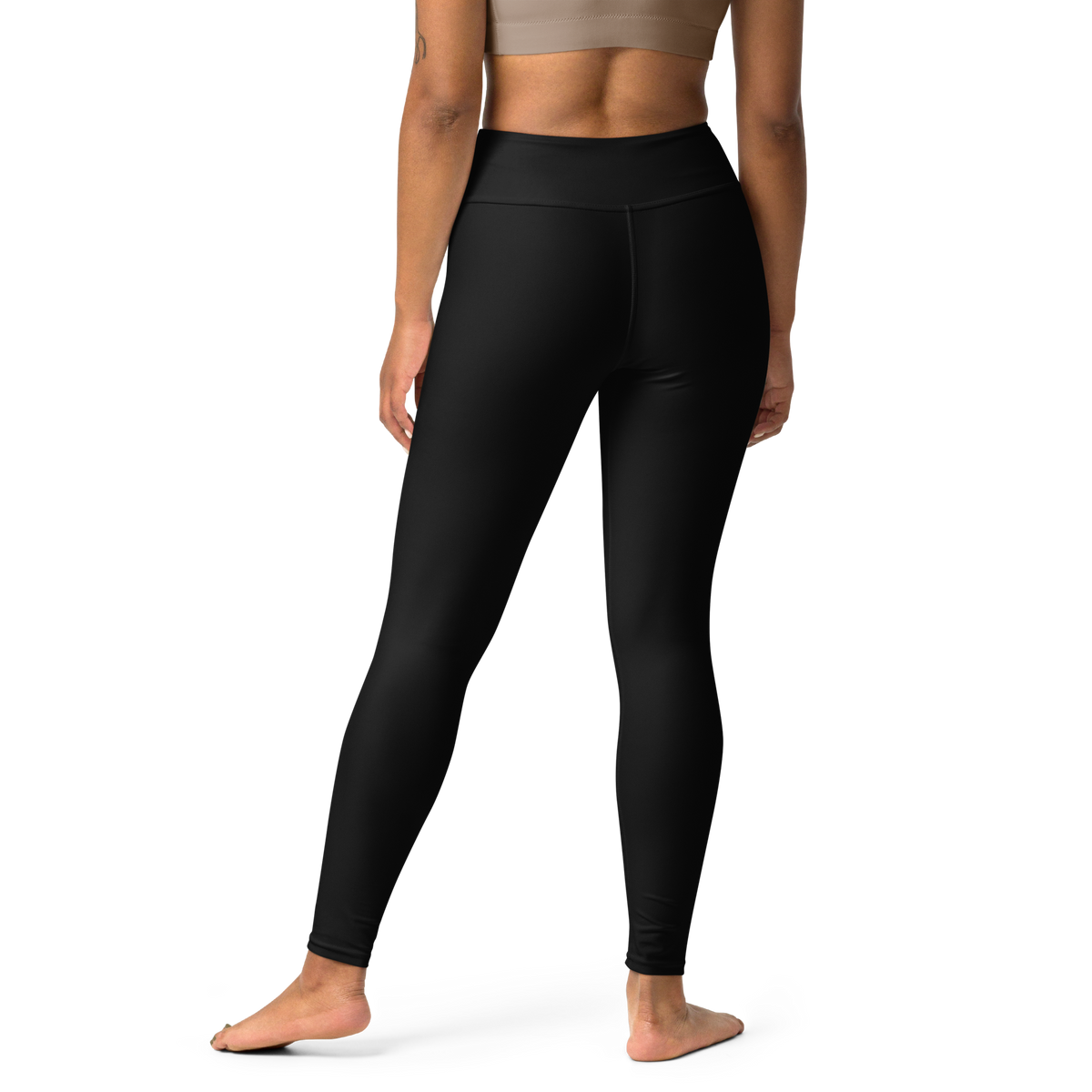 Plain Black high-waisted yoga leggings, back view.