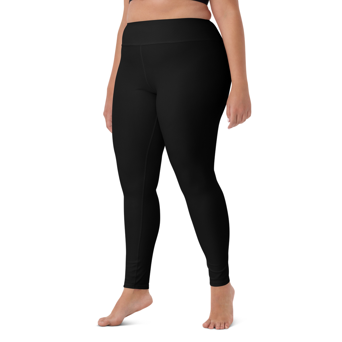 Plain Black high-waisted yoga leggings, larger-model left-front view.