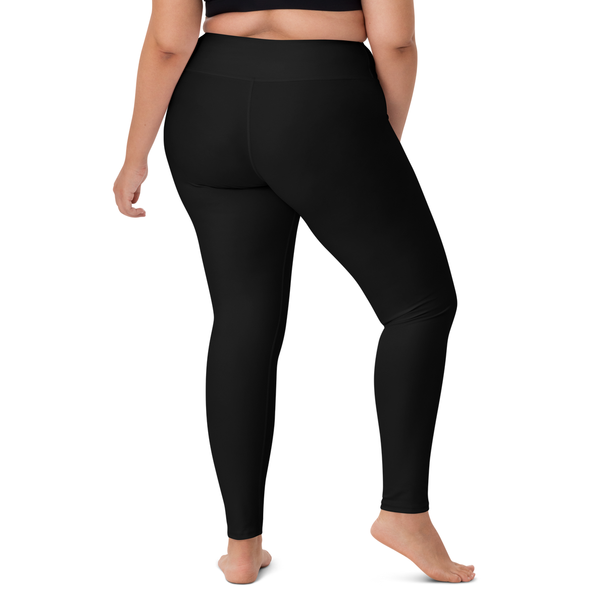 Plain Black high-waisted yoga leggings, larger-model right-back view.