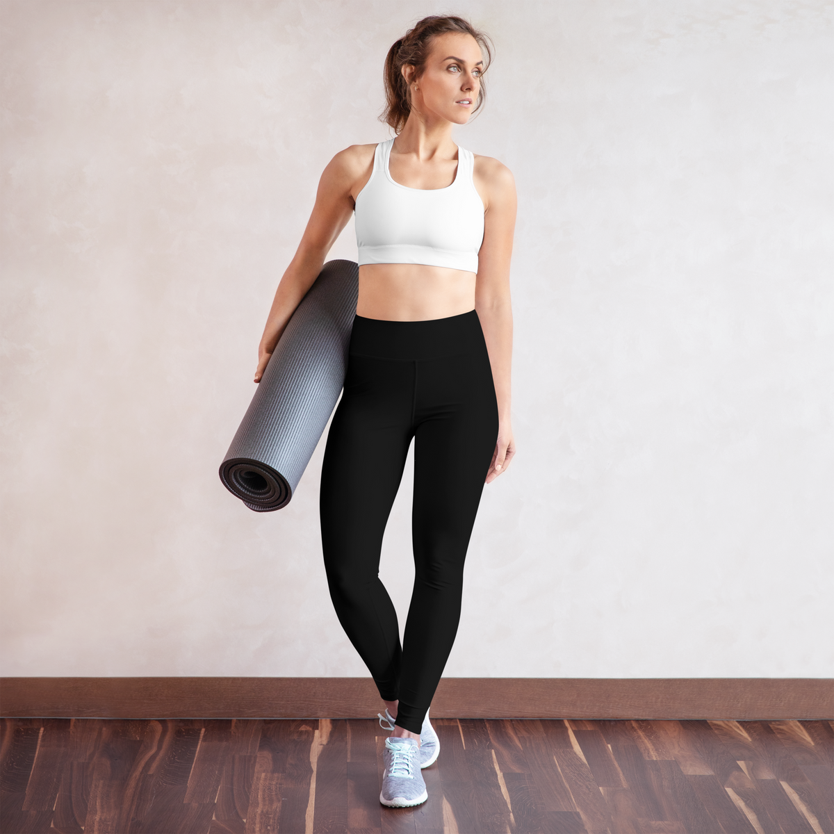 Plain Black high-waisted yoga leggings, yoga lifestyle view.