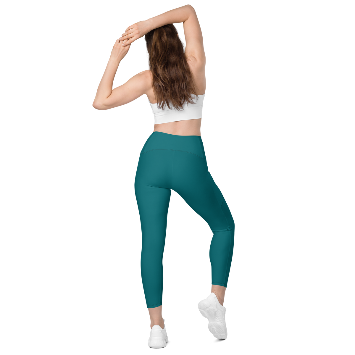 Plain Harbour Blue high-waisted pocket leggings, back view.
