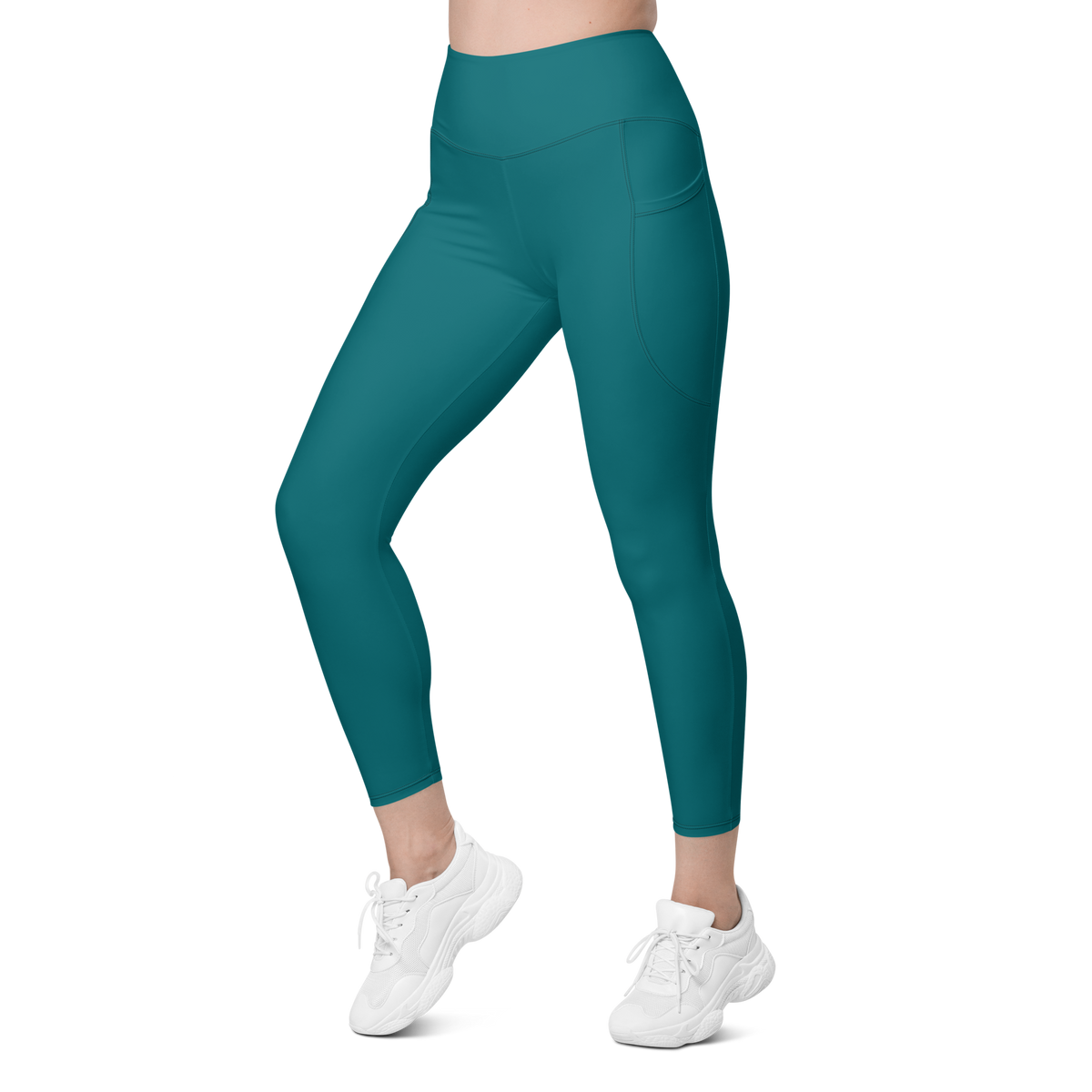 Plain Harbour Blue high-waisted pocket leggings, left-front view.