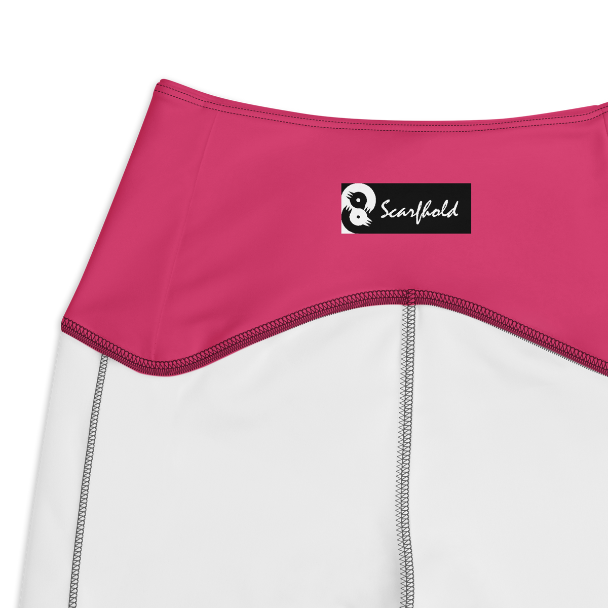 Plain Innuendo high-waisted pocket leggings, inside-label and construction detail.