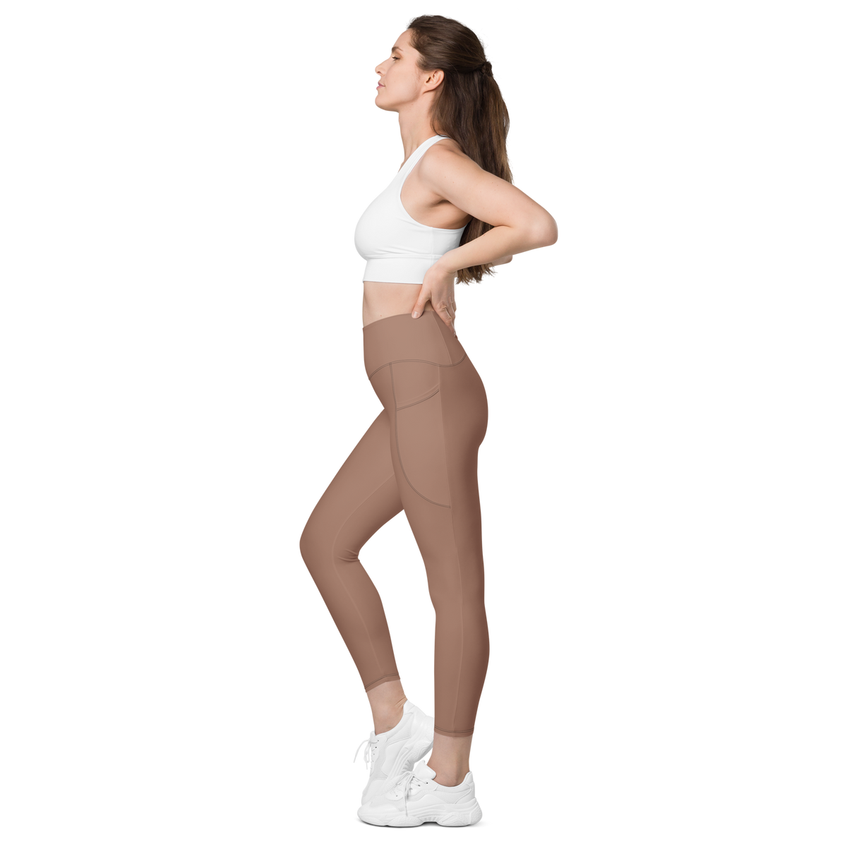Plain Mocha Mousse high-waisted pocket leggings, pocket-in-use view.