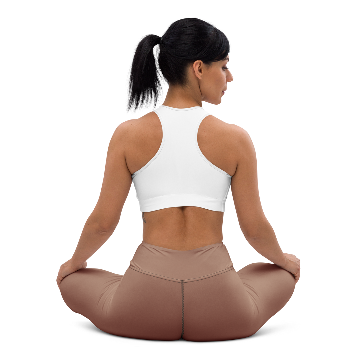 Plain Mocha Mousse high-waisted yoga leggings, seated back view.
