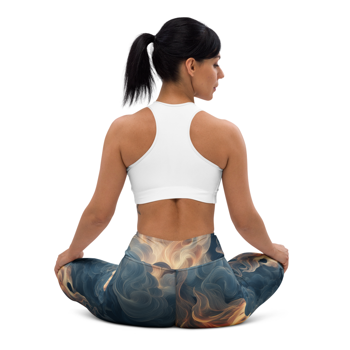 Pluma Blue high-waisted yoga leggings, seated back view.