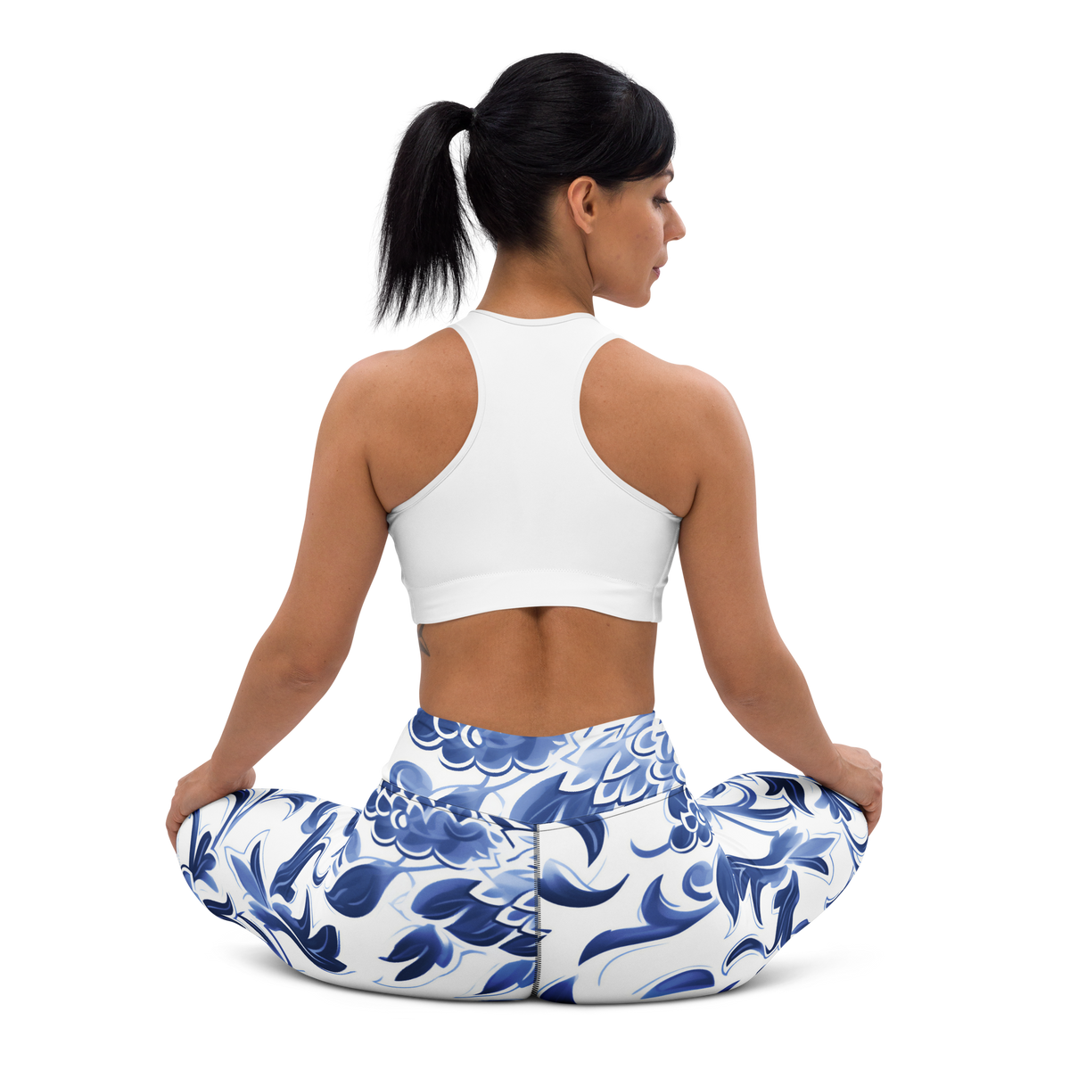 Porcelain high-waisted yoga leggings, seated back view.