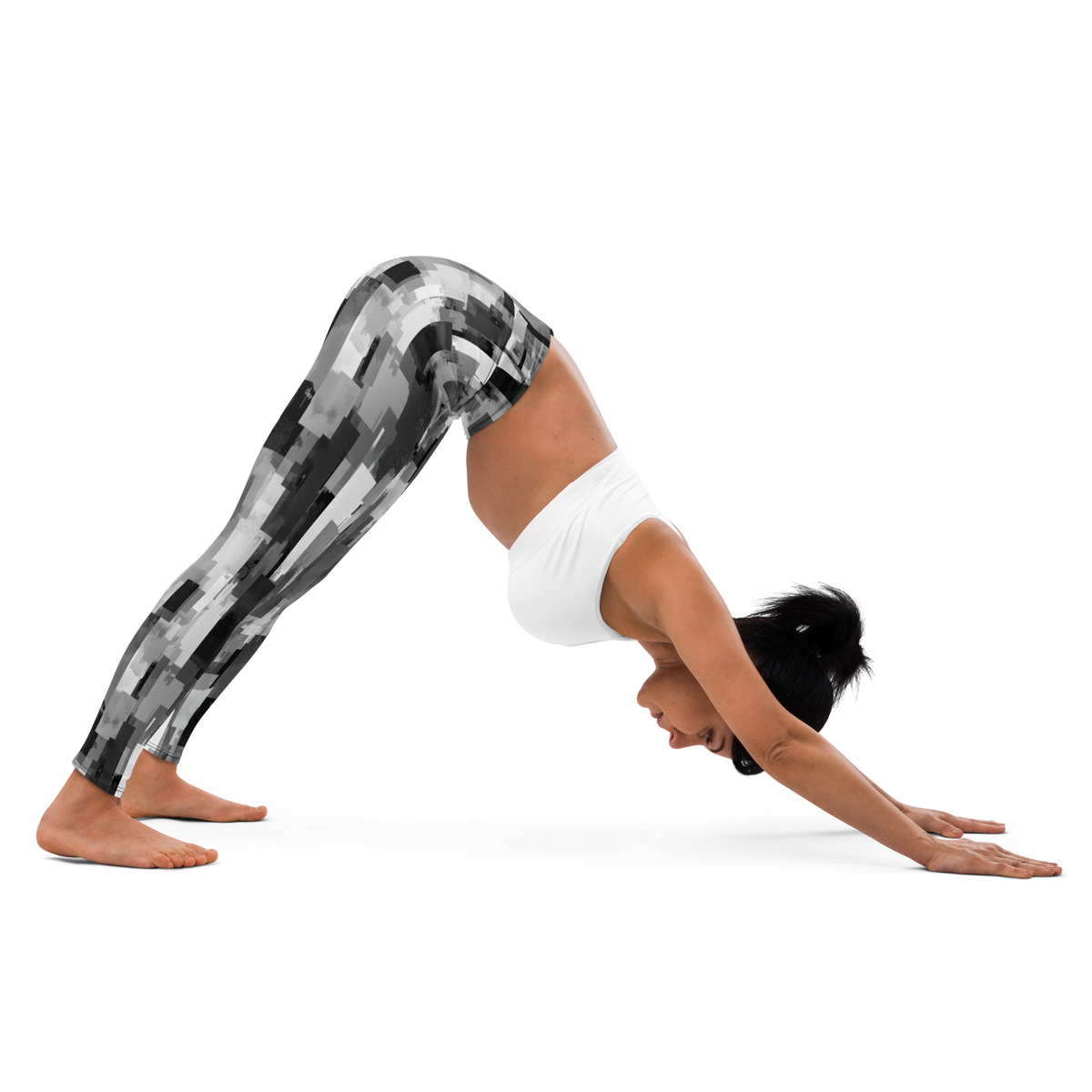 Statique Greyscale camouflage high-waisted yoga leggings, downward-dog stretch view.