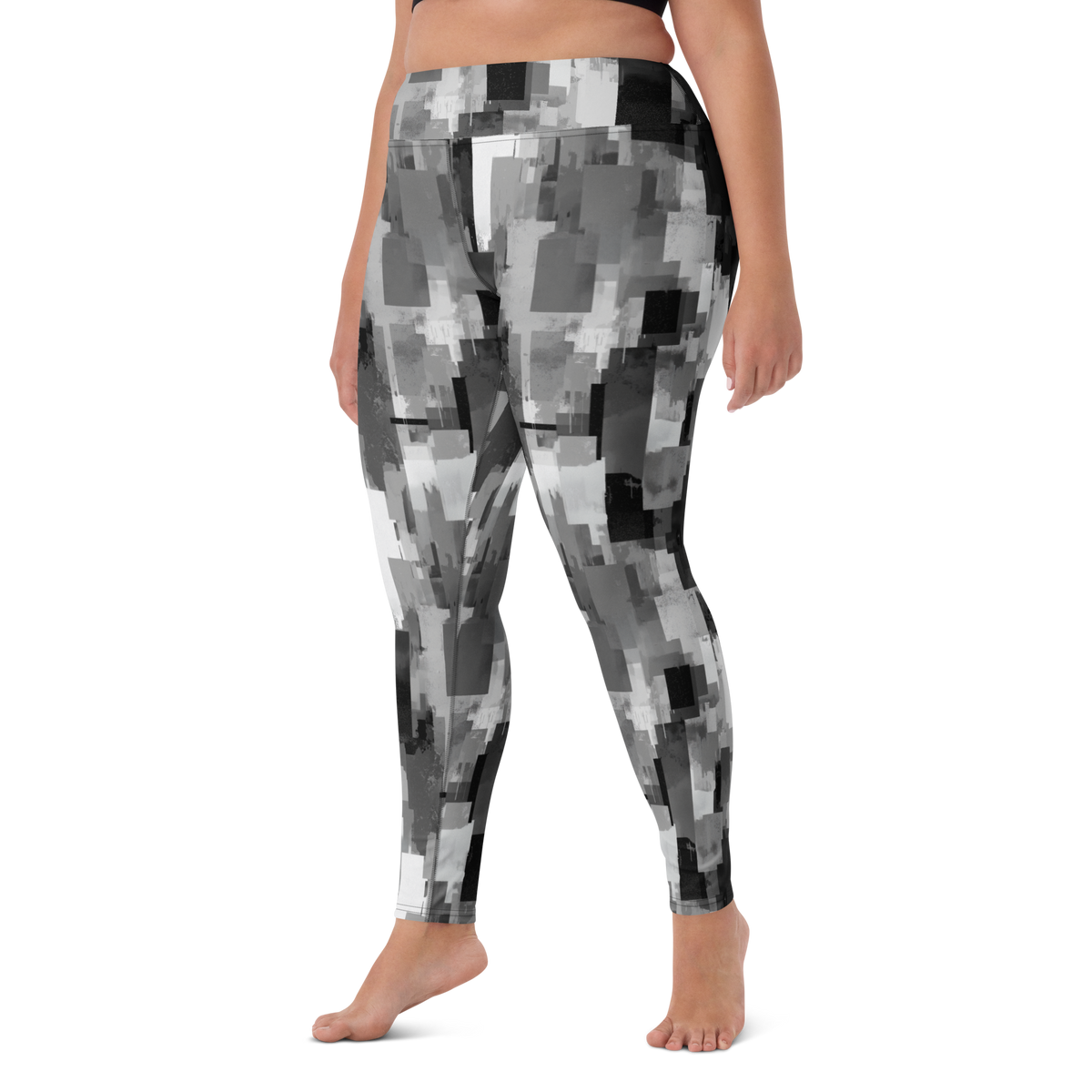 Statique Greyscale camouflage high-waisted yoga leggings, larger-model left-front view.