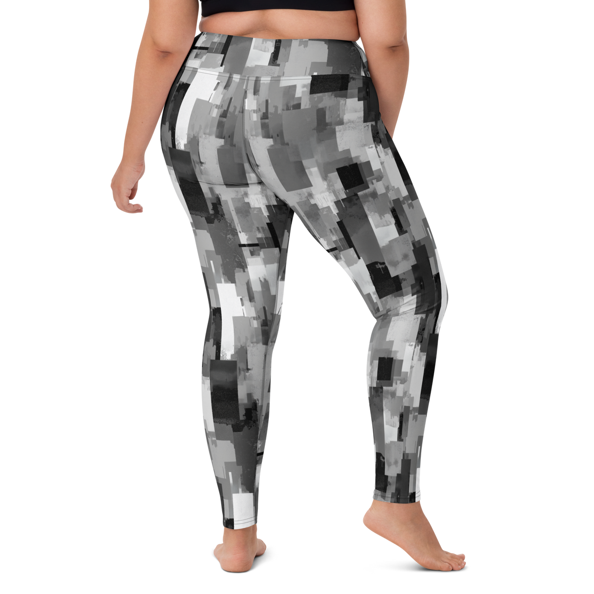 Statique Greyscale camouflage high-waisted yoga leggings, larger-model right-back view.