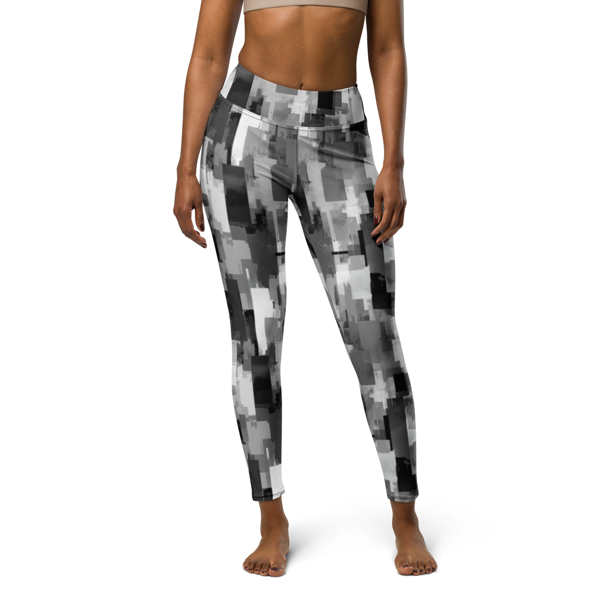 Statique · Greyscale high-waisted yoga leggings, front view.
