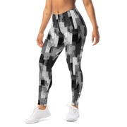 Statique · Greyscale mid-rise everyday leggings, left-front view.
