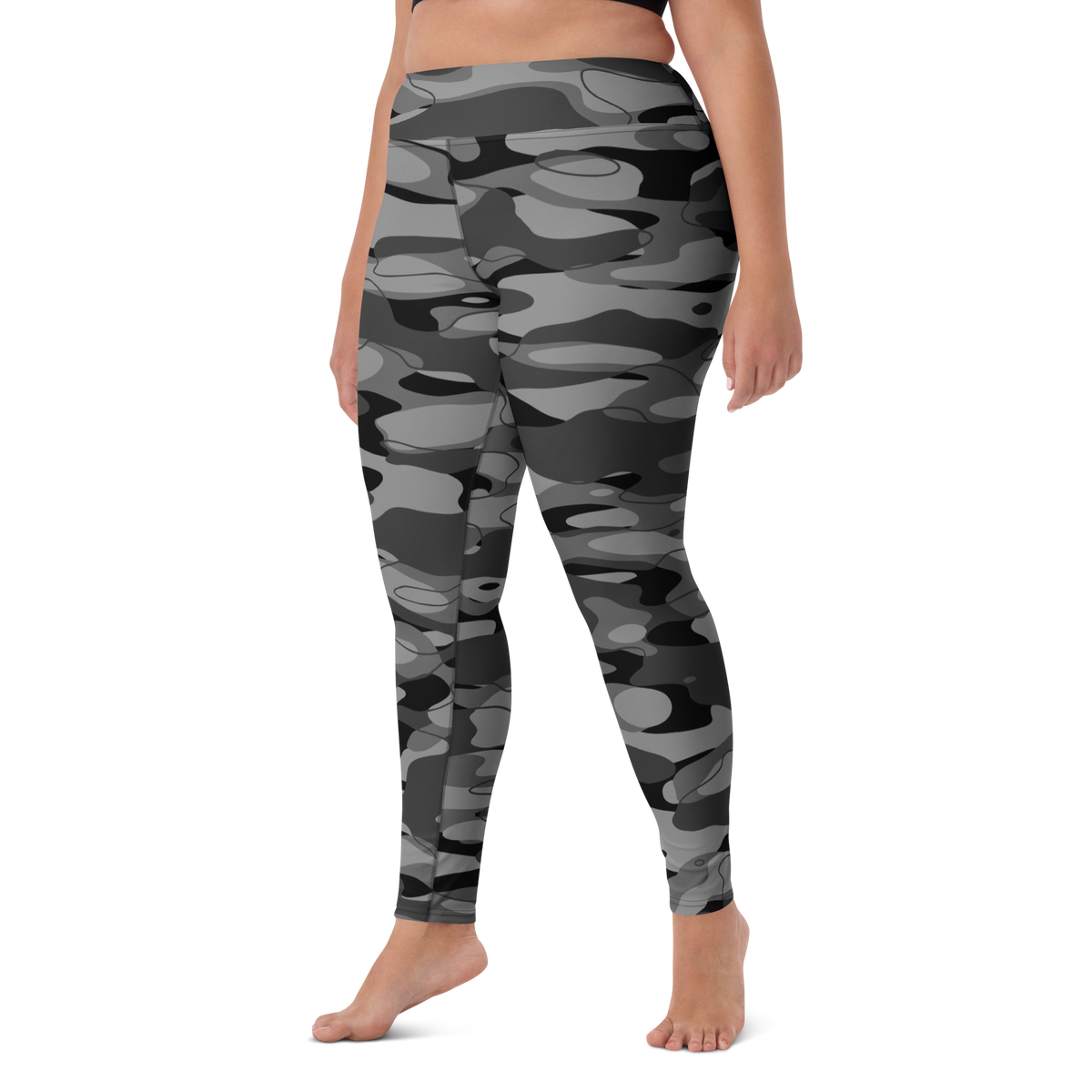 Tideway Greyscale high-waisted yoga leggings, larger-model left-front view.