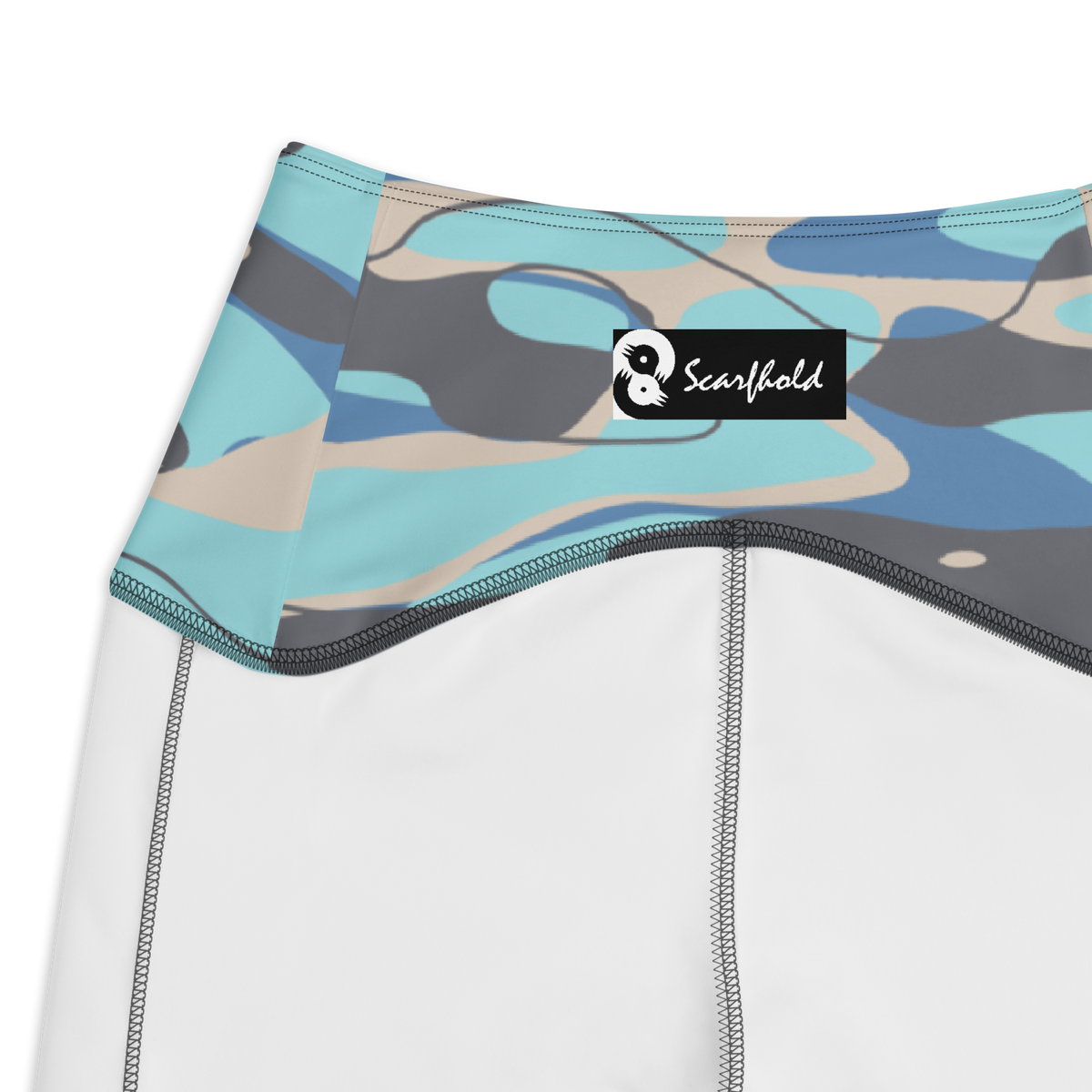 Tideway Winter high-waisted pocket leggings, inside-label and construction detail.