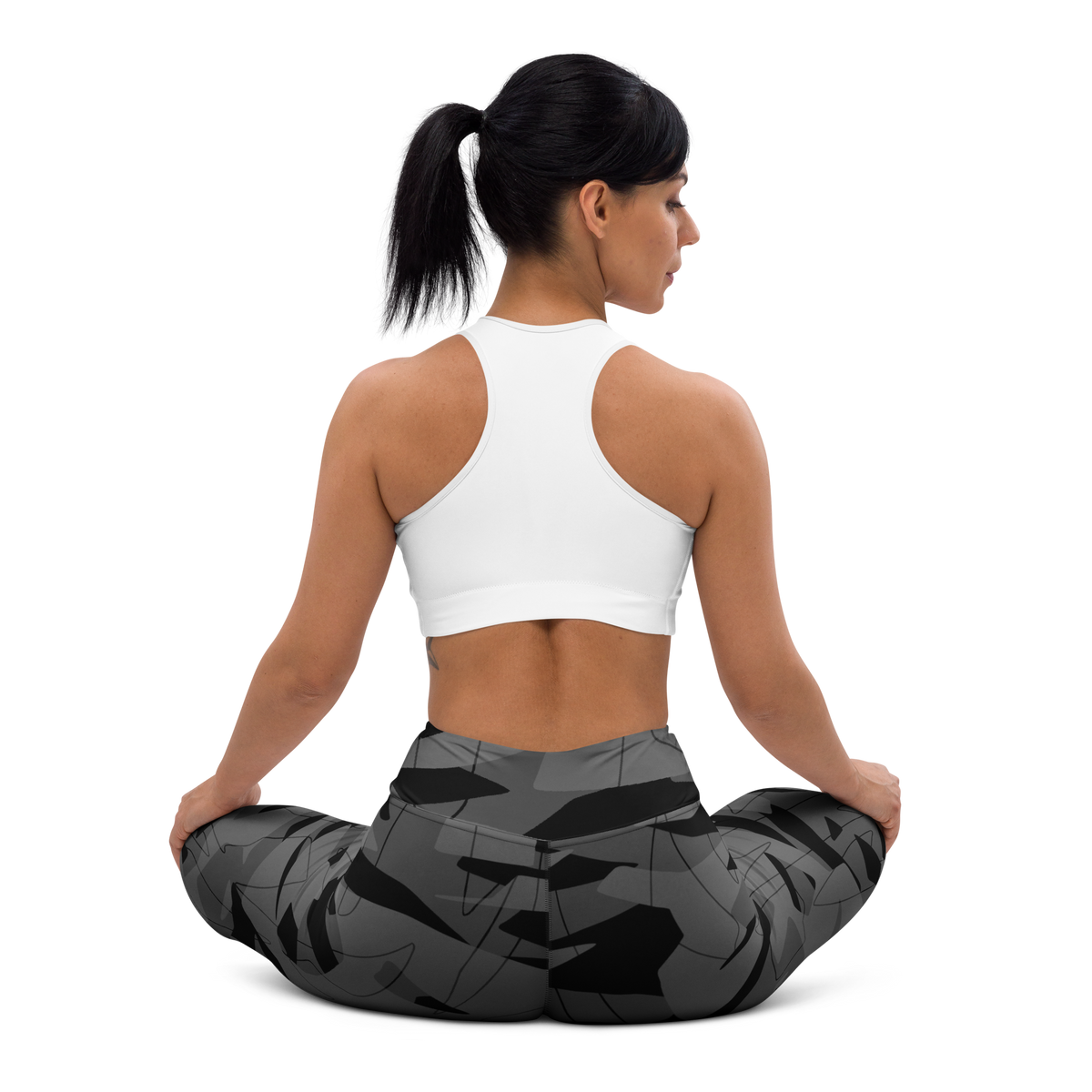Timbre Greyscale 1 camouflage high-waisted yoga leggings, seated back view.