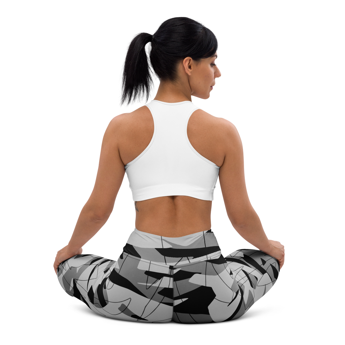 Timbre Greyscale 3 camouflage high-waisted yoga leggings, seated back view.