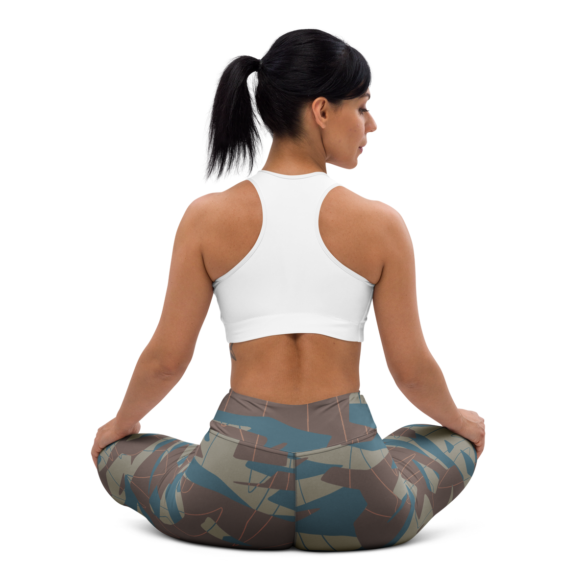 Timbre Subtle Contrasts camouflage high-waisted yoga leggings, seated back view.