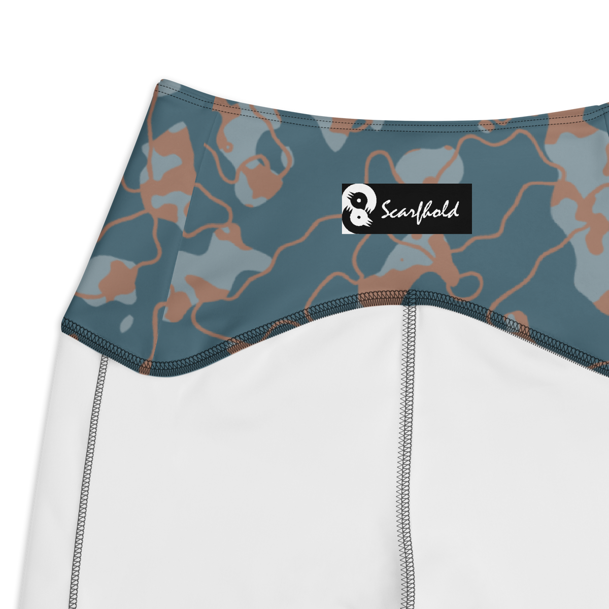 Tundra Subtle Contrasts camouflage high-waisted pocket leggings, inside-label and construction detail.